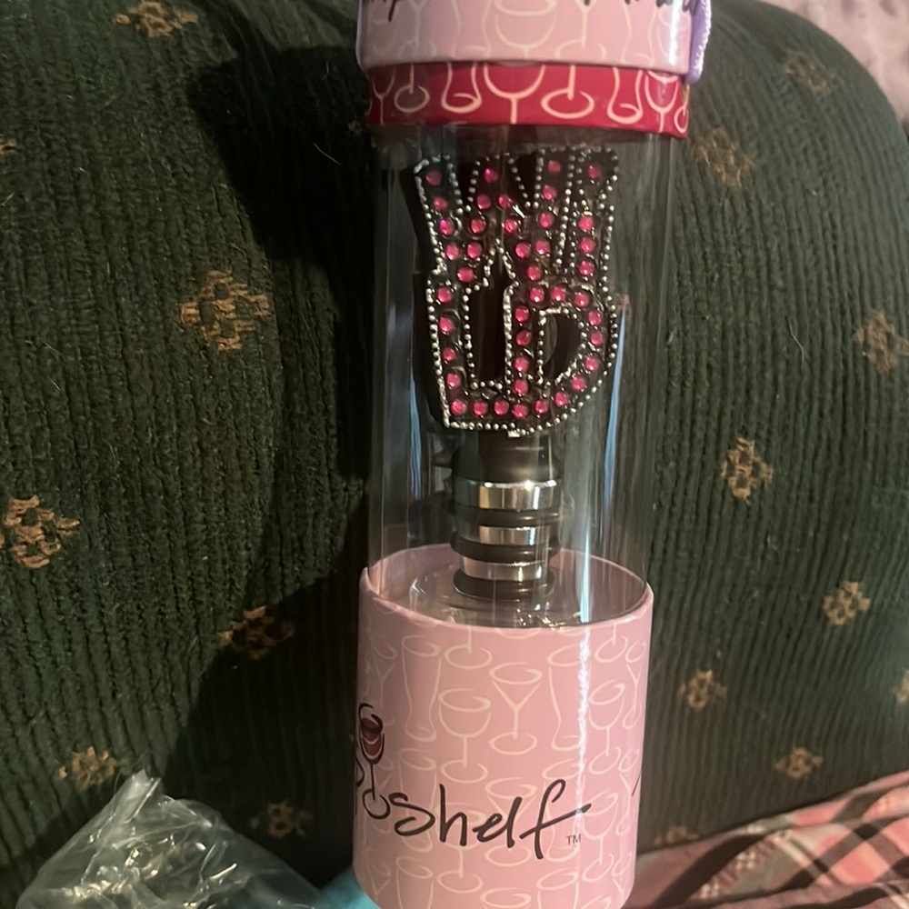 New in package top shelf wine topper says wild